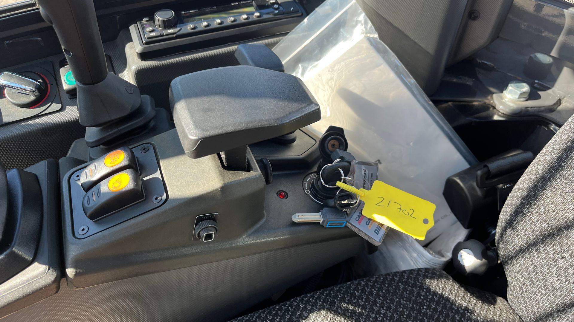 Case CX19D Fabriksny maskine klar til brug.