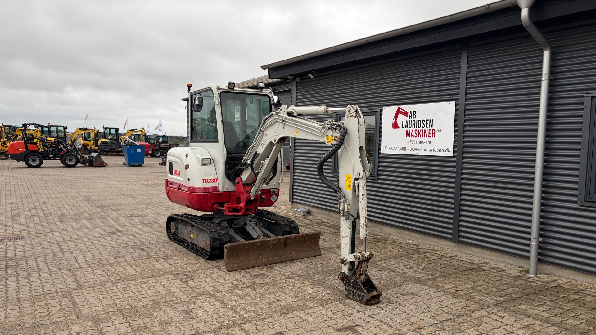 Takeuchi TB230 S40 skifte