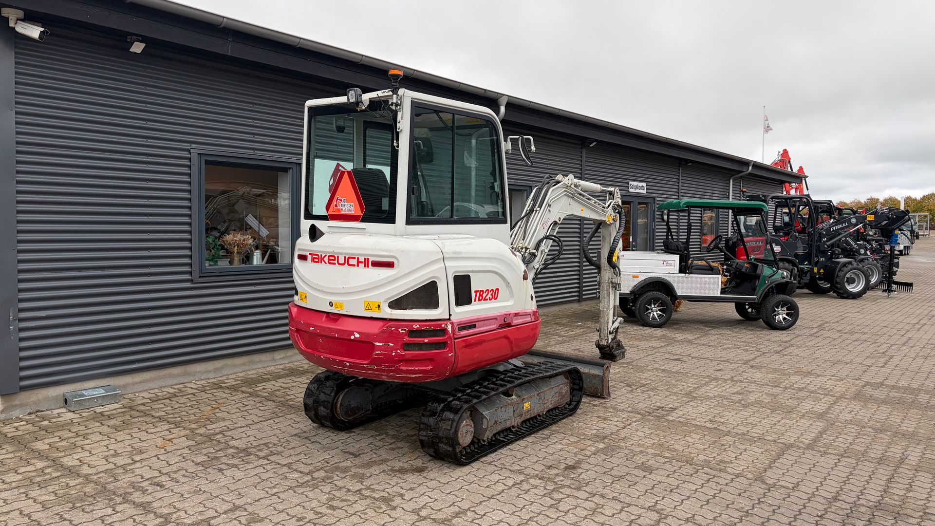 Takeuchi TB230 S40 skifte