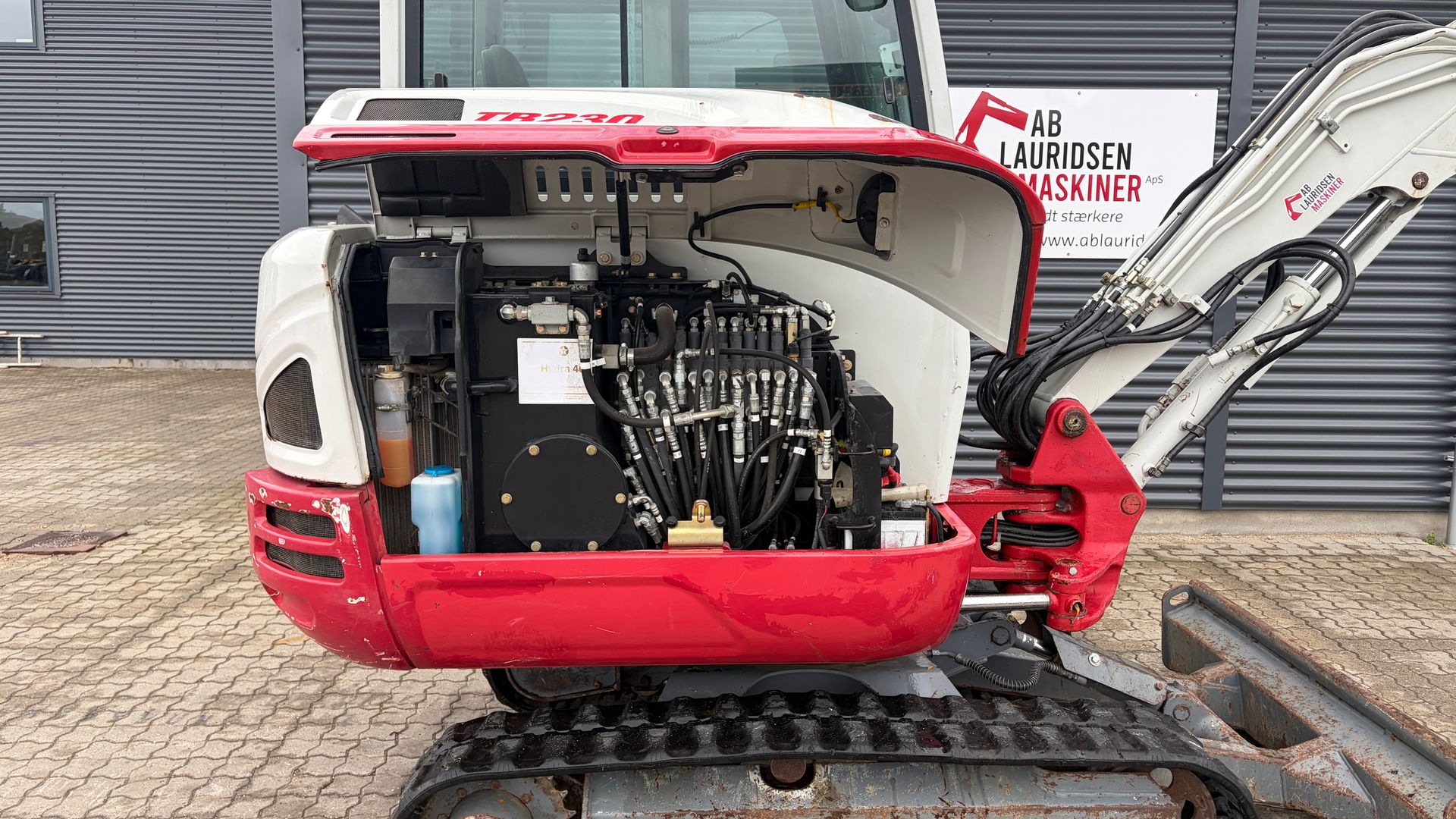 Takeuchi TB230 S40 skifte